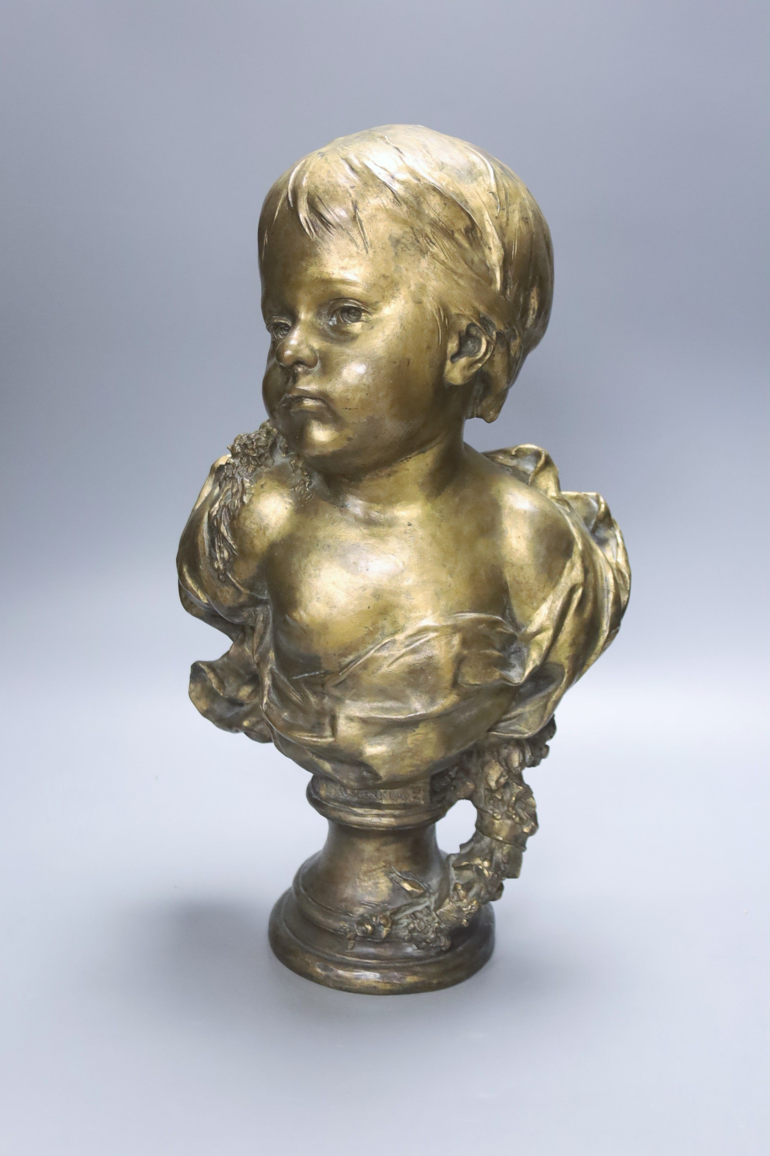 After Anton Nelson. A bronze bust of a child, height 47cm